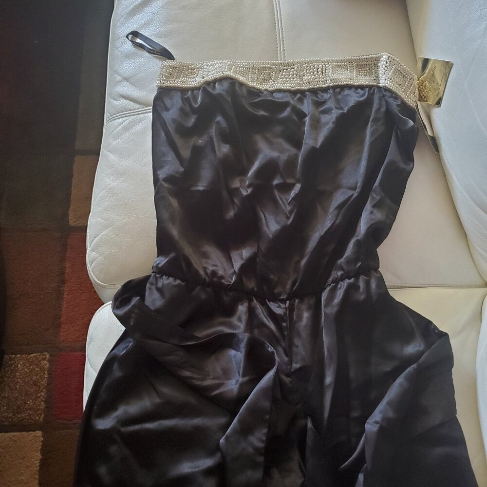 Size 5 Brand New Sleeveless Black jumpsuit